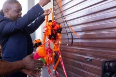 Hon Minister of SMEs Dev officially openning the warehouse